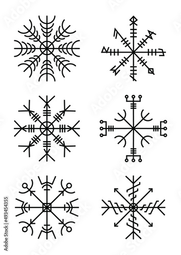 Ancient pagan talisman. Vector set of mystical viking runes. Norse amulet, ethnic talisman. Isolated icon set of line art signs, tattoo sketches.