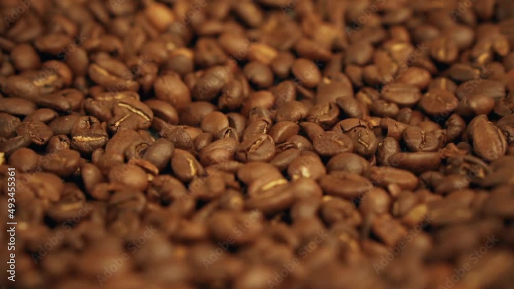 Coffee beans rotating slowly Coffee beans rotating slowly