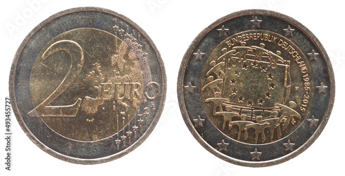Wallpaper Mural Germany - circa 2015 : a 2 Euro coin of Germany with a map of Europe and a European flag and people holding the flag. 30 years anniversary Torontodigital.ca