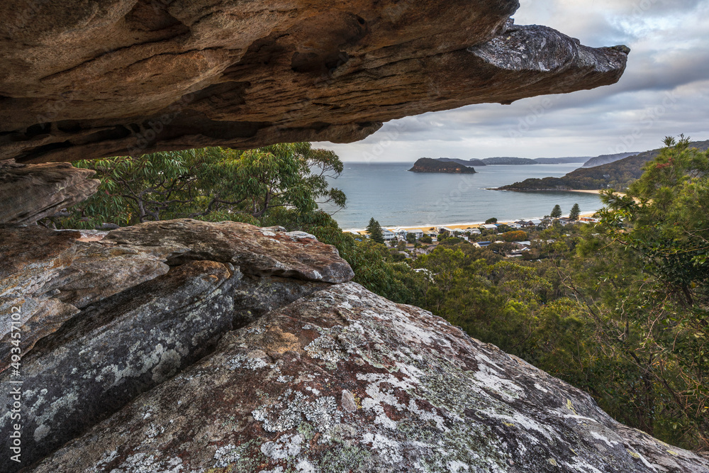 View from a rock cave towards lion island and pearl beach