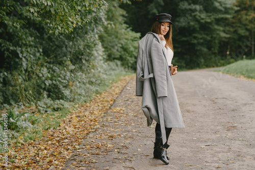 Elegant woman in a autumn park