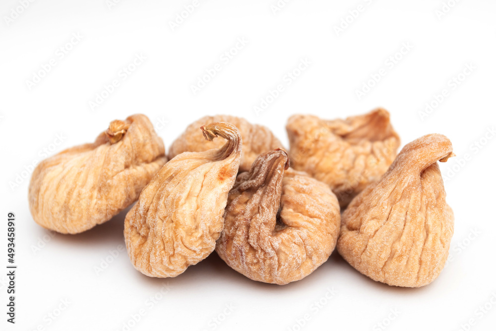 heap of Dried figs on a white background heap of Dried figs on a white background