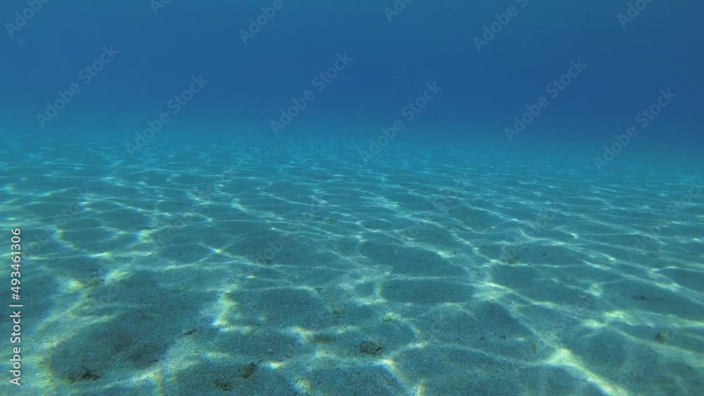 Changeable movement of solar textures in shallow sand, tripod. Changeable movement of solar textures in shallow sand, tripod.