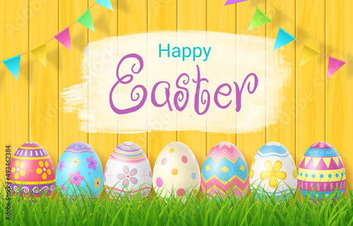 Happy Easter Day colorful egg on grass and beautiful wood background with copy space