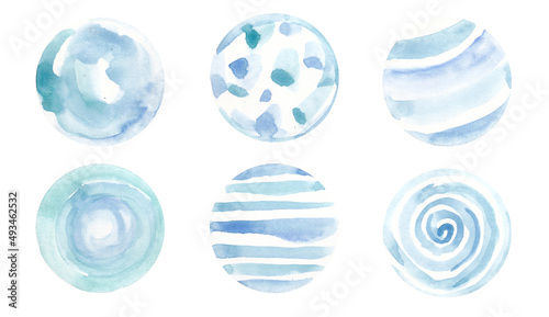 A set of hand-drawn watercolor circles. Circles of cool green, soft blue and blue colors isolated on a white background.