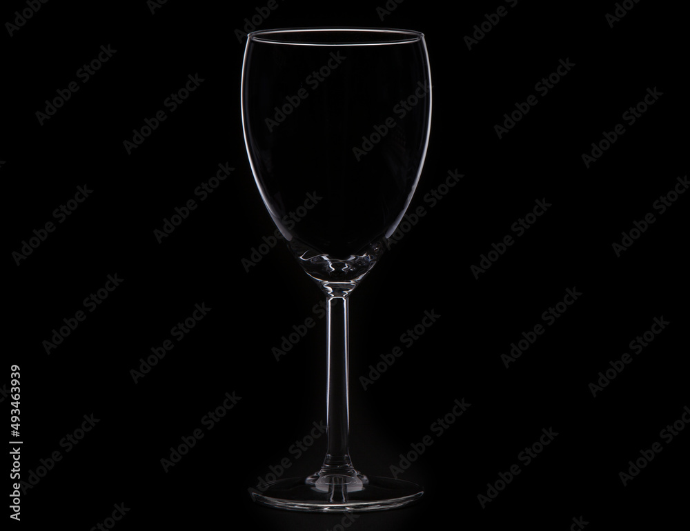 glass goblet on black background