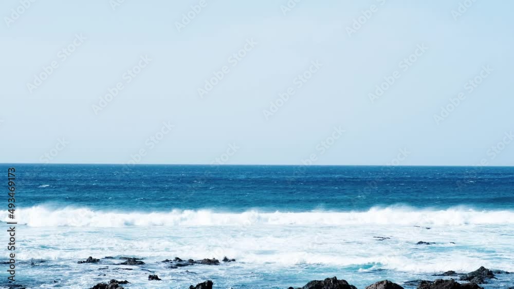 Awesome power waves breaking over dangerous rocks Awesome power waves breaking over dangerous rocks