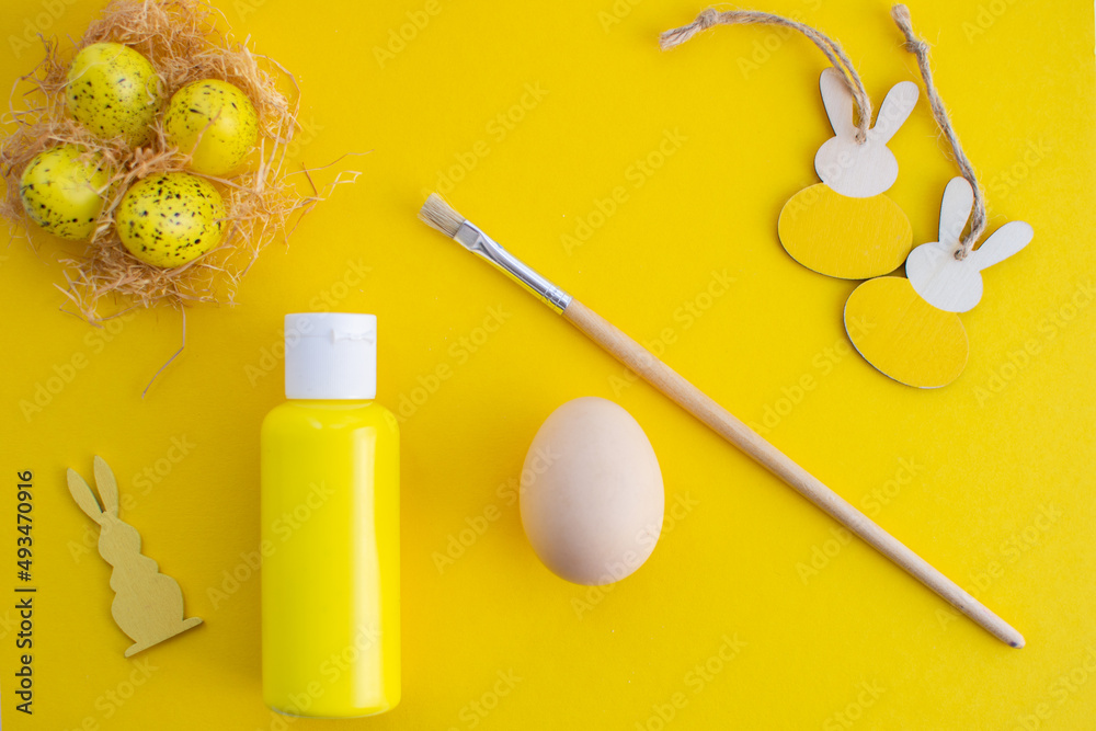 Preparing for Easter, decorations and painting an egg Preparing for Easter, decorations and painting an egg