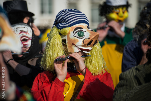 Fotobehang Basel - Switzerland - 9 March 2022 - portrait of masked people wearing tradition