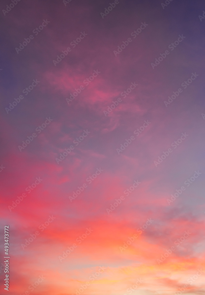 sunset sky vertical in the evening with colorful sunrise clouds background