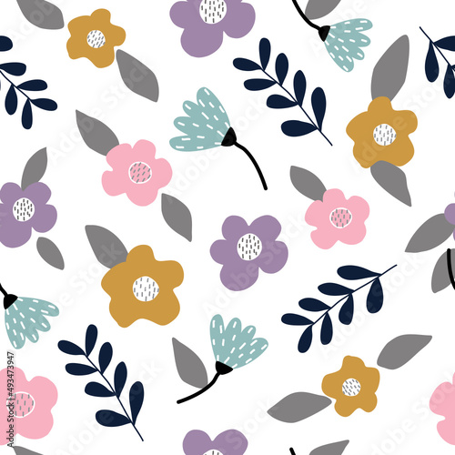 Seamless cute floral pattern on white background. Use it for wall prints, pillows, interiors, kids wear and shirts, greeting cards, vectors and more.