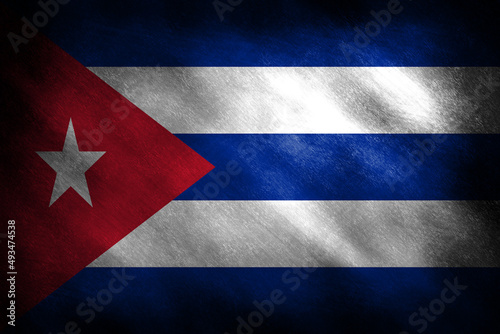 The flag of Cuba on a grunge background