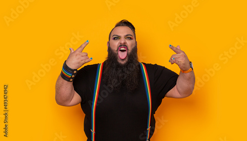 Big bearded man with a rocker tongue face photo