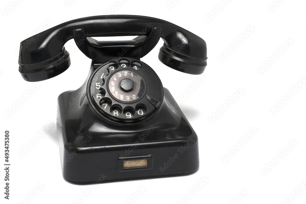 Closeup bakelite landline phone dial white background Closeup bakelite landline phone dial white background