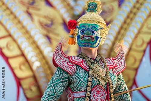 Masked giant dancing khon ramayana khon Ravana. Giant carrying a sword. Ramayana story. photo
