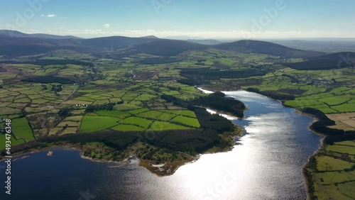 Blessington Lakes, Wicklow, Ireland, March 2022. Drone pushes south towards Monamuck above the Liffey Reservoir with Blackditches Upper and Lockstown Upper in the distance. photo