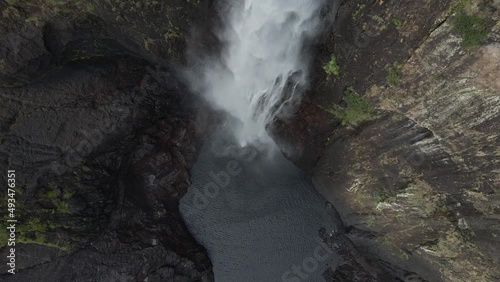 Water From Wallaman Falls Flowing Into Natural Pool At Girringun National Park. - aerial top down photo