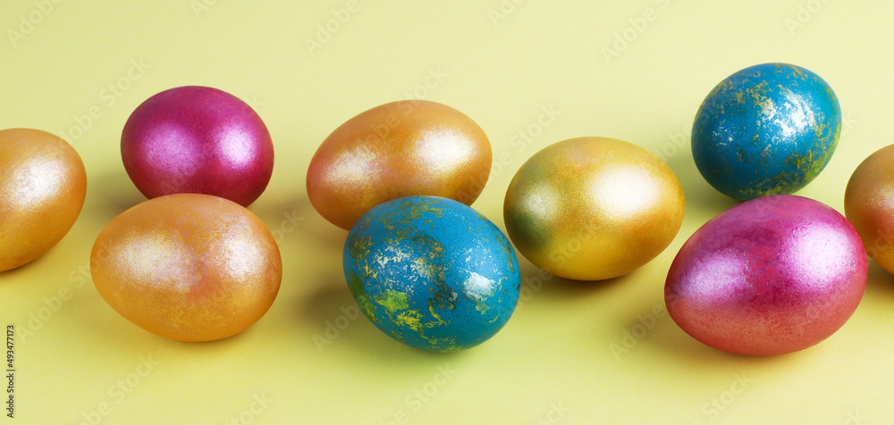 Red Easter eggs on a bright background. Easter background with eggs close up. Place for text. Red Easter eggs on a bright background. Easter background with eggs close up. Place for text.