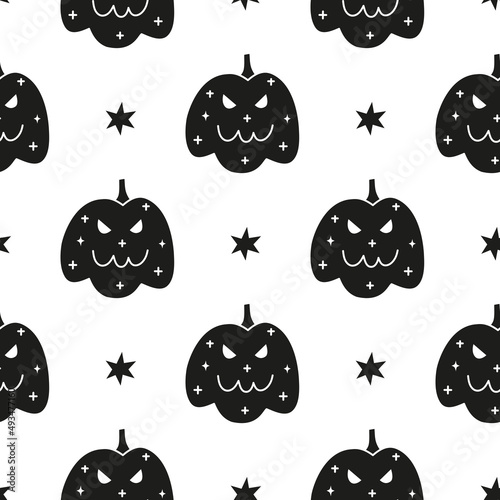 Seamless pattern with doodle pumpkins.