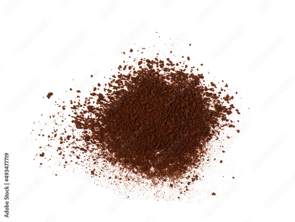 Coffee or chocolate powder ingredient burst isolated on white background Coffee or chocolate powder ingredient burst isolated on white background