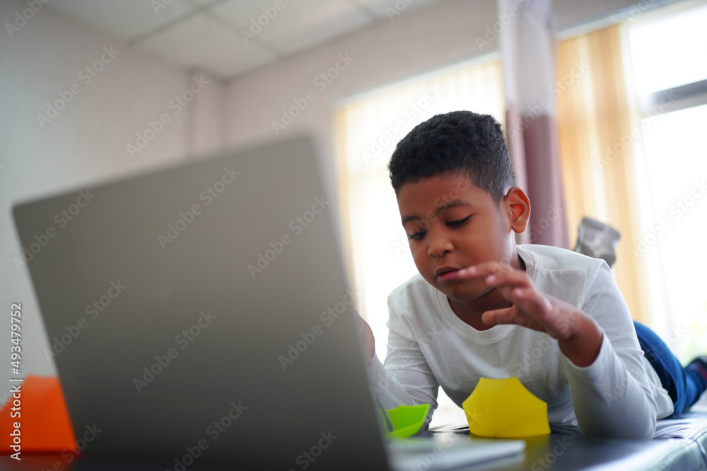 portrait of mixed race kid using mobile phone. portrait of mixed race kid using mobile phone.