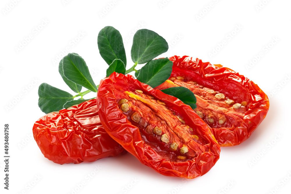 Dried or Sundried tomato halves with fenugreek  isolated - obrazy, fototapety, plakaty 