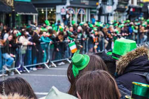 Obraz na plátně Saint Patrick's day parade in Dublin 2022, green hats in the crowd