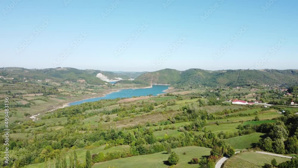 View of countryside lake Rovni, Serbia and hilly landscape in autumn colors. View of countryside lake Rovni, Serbia and hilly landscape in autumn colors.