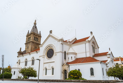 Side facade with rose window of the Church of Nossa Senhora da Ajuda, Espinho PORTUGAL photo