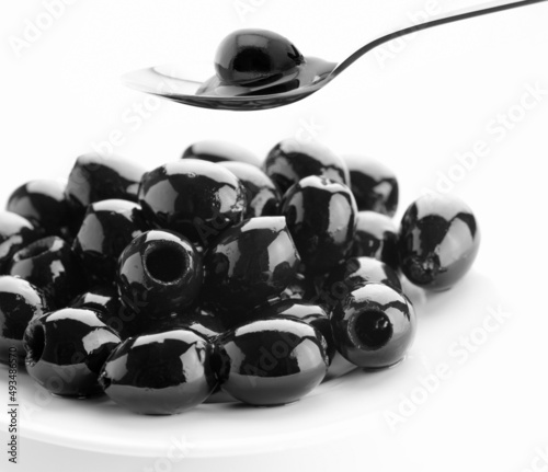 black olives on white background
