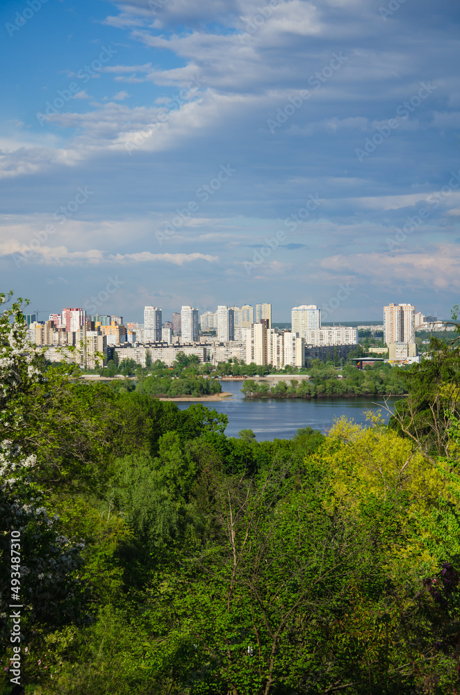 Kyiv, Ukraine May 15, 2021 view of residential buildings on river coast Kyiv, Ukraine May 15, 2021 view of residential buildings on river coast