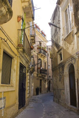 Narrow and picturesque street on Ortigia Island in Siracusa  Sicily  Italy