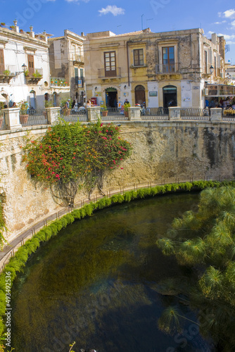 The Fountain of Arethusa in a sunny summer day in Syracuse, Sicily, Italy