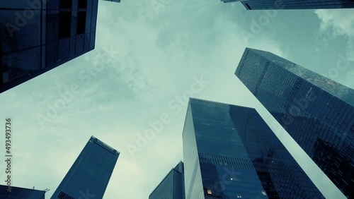 modern office skyscrapers in the city , business theme , time lapse