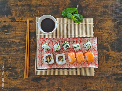 top view of sushi set with different types of maki rolls photo