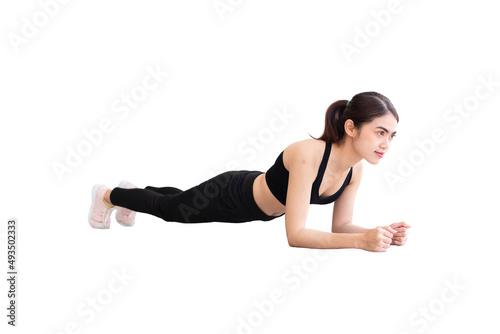 Southeast Asian woman wearing black workout clothes doing planks and white background.