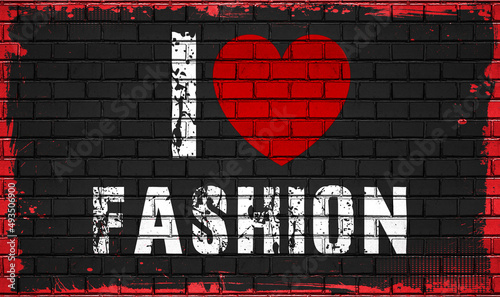i love fashion concept on black wall with red heart