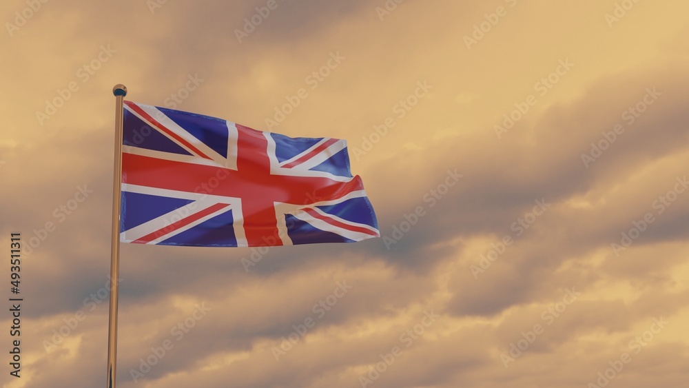 the flag of Great Britain in the wind against the background of a dramatic sunset sky. St. Georges day. 