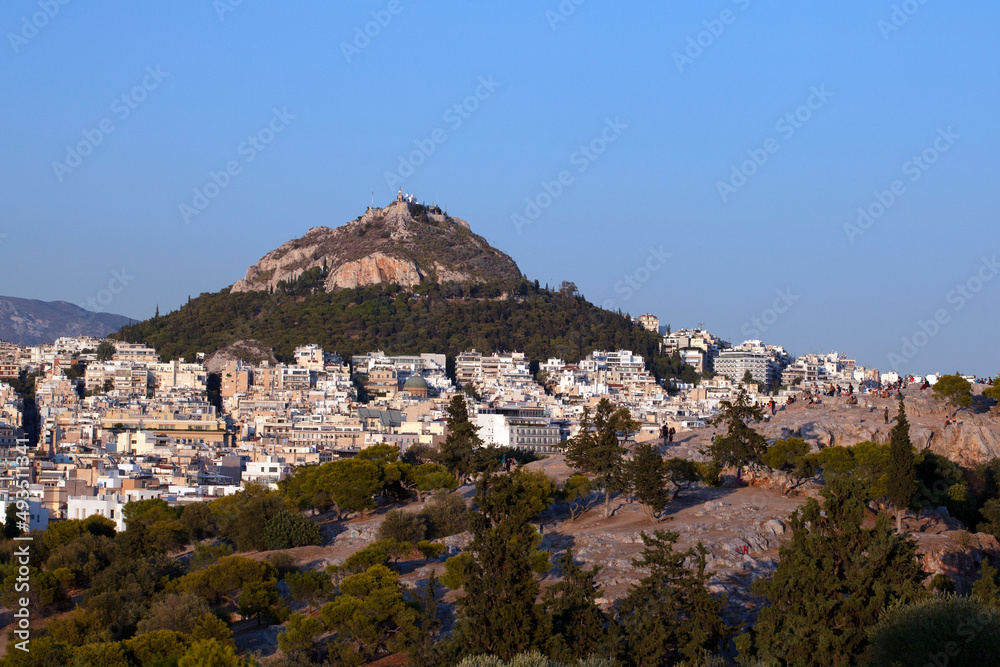 colourful buildings around  Lycabettus hill in Athens, Greece. Sunny afternoon