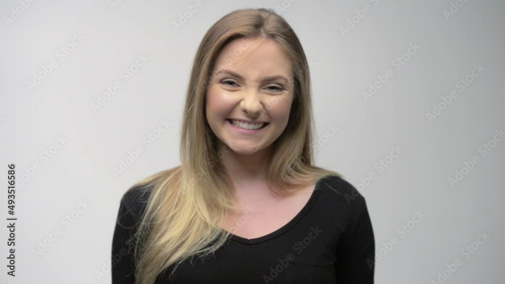 Young blonde woman isolated in studio portrait Young blonde woman isolated in studio portrait