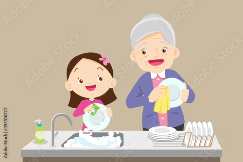 cute little girl washing dish with grandmother