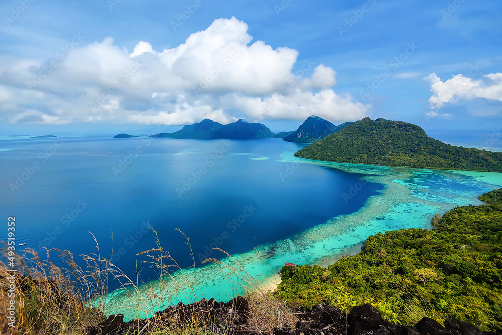 Corals reef and islands seen from the peak of Bohey Dulang Island, Sabah, Malaysia.