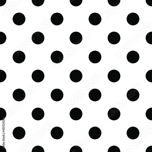 Polka dot seamless black and white vector pattern.

