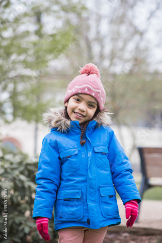 portrait of beautiful girl in winter clothes