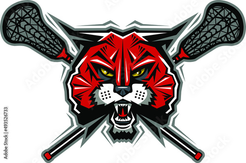 wildcat mascot with crossed lacrosse sticks for school, college or league