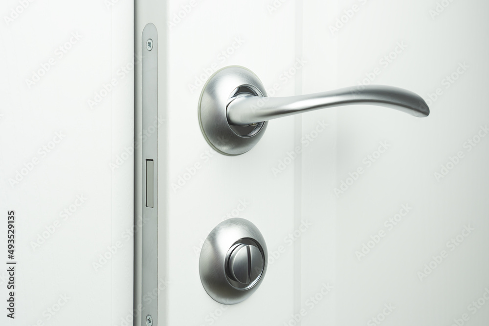 Naklejka premium Door handle with lock and modern magnetic latch. Interior doors fittings.