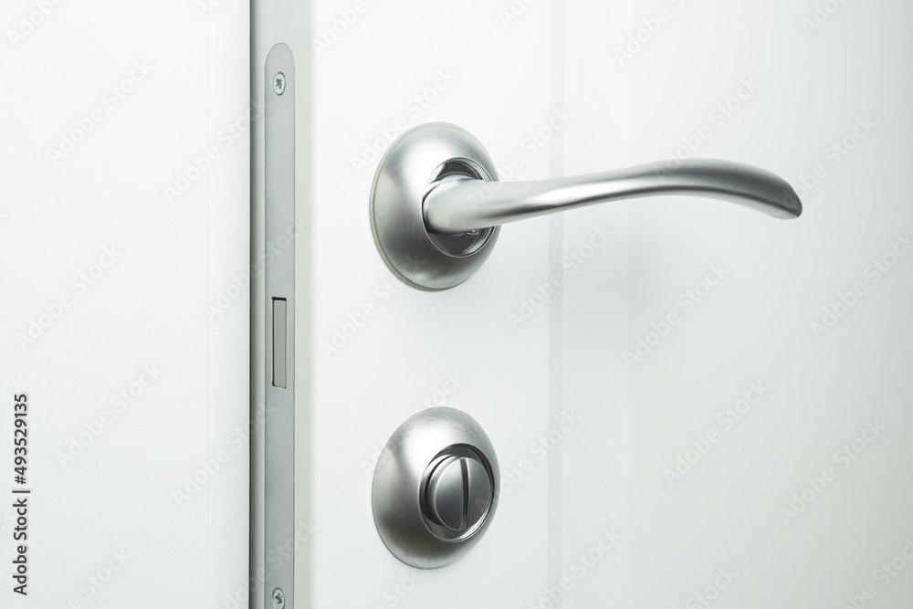 Door handle with lock and modern magnetic latch. Interior doors fittings. Door handle with lock and modern magnetic latch. Interior doors fittings.