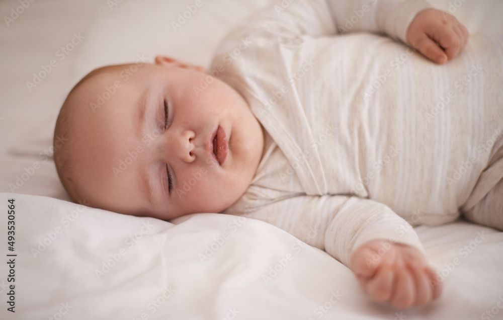 Hes out for the count. Cropped shot of an adorable baby boy asleep. Hes out for the count. Cropped shot of an adorable baby boy asleep.