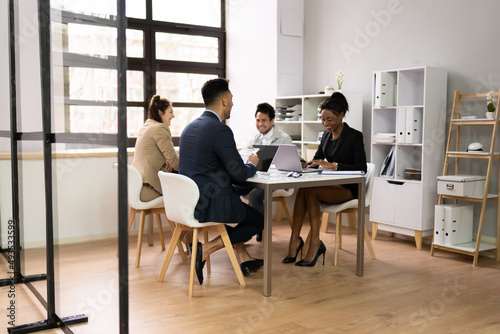 Diverse Business People Discussions In Office