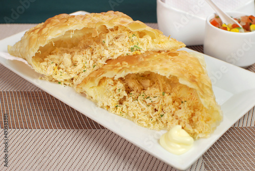 Traditional pastry called pastel stuffed with chicken